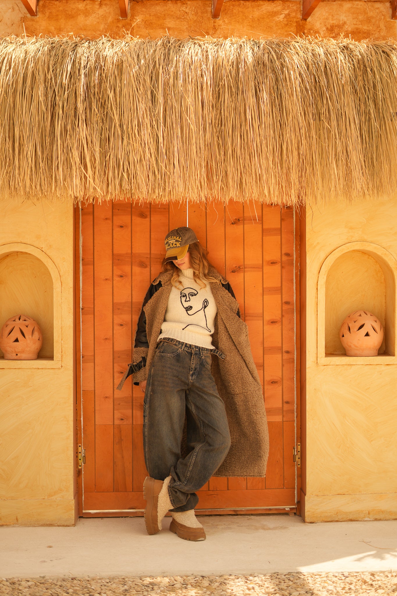 raw edge faux leather long coat