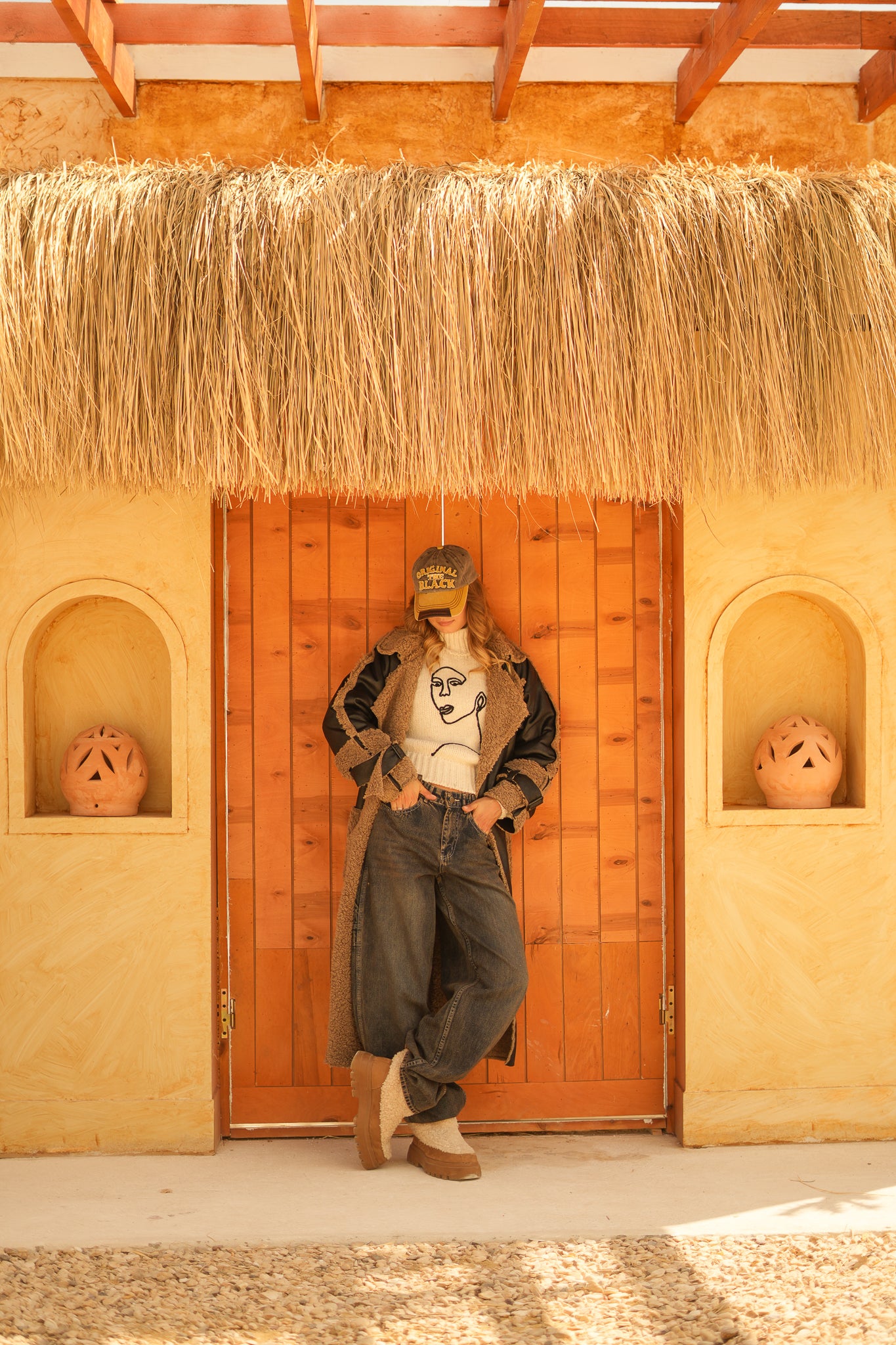 raw edge faux leather long coat