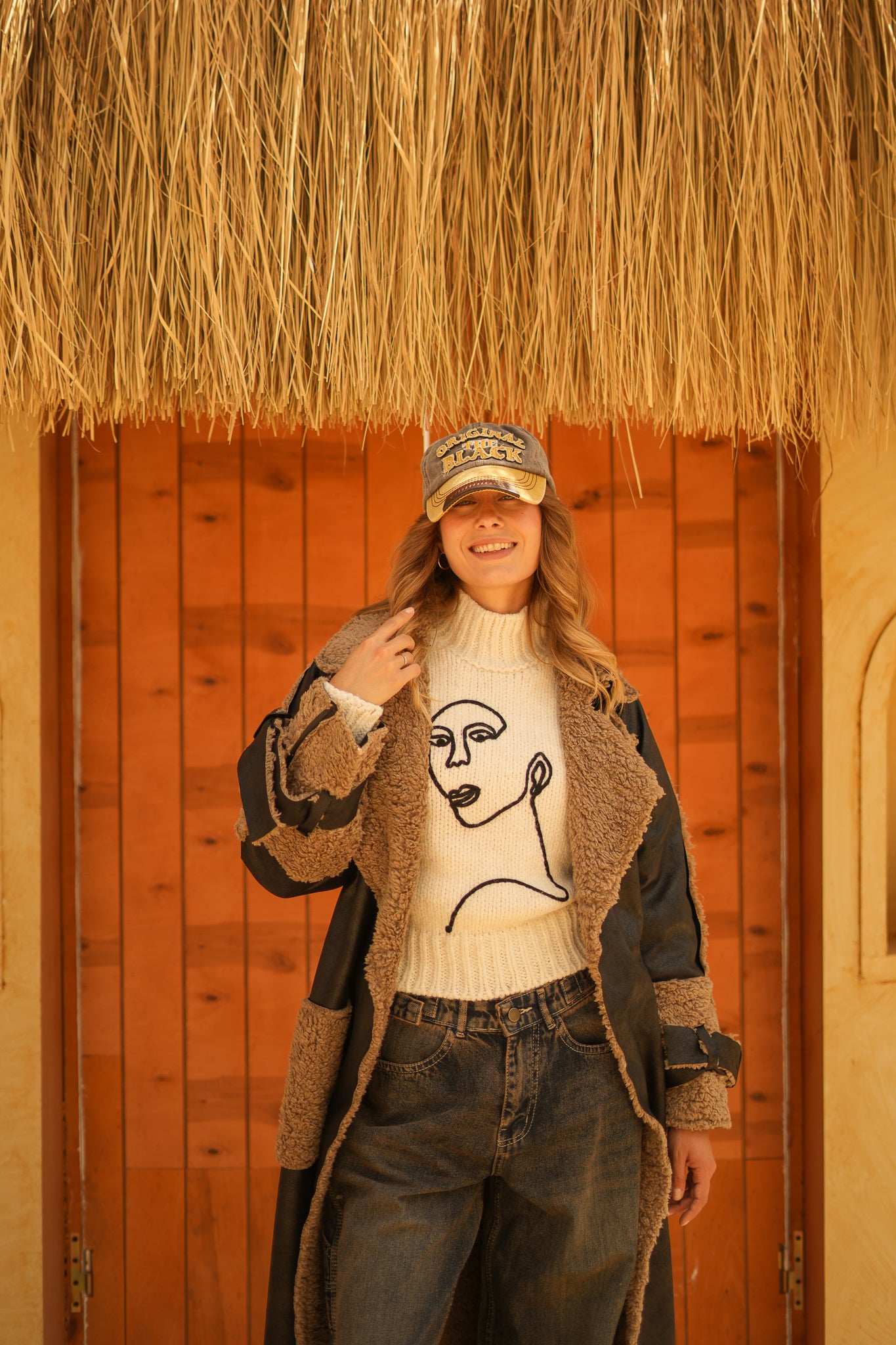 raw edge faux leather long coat