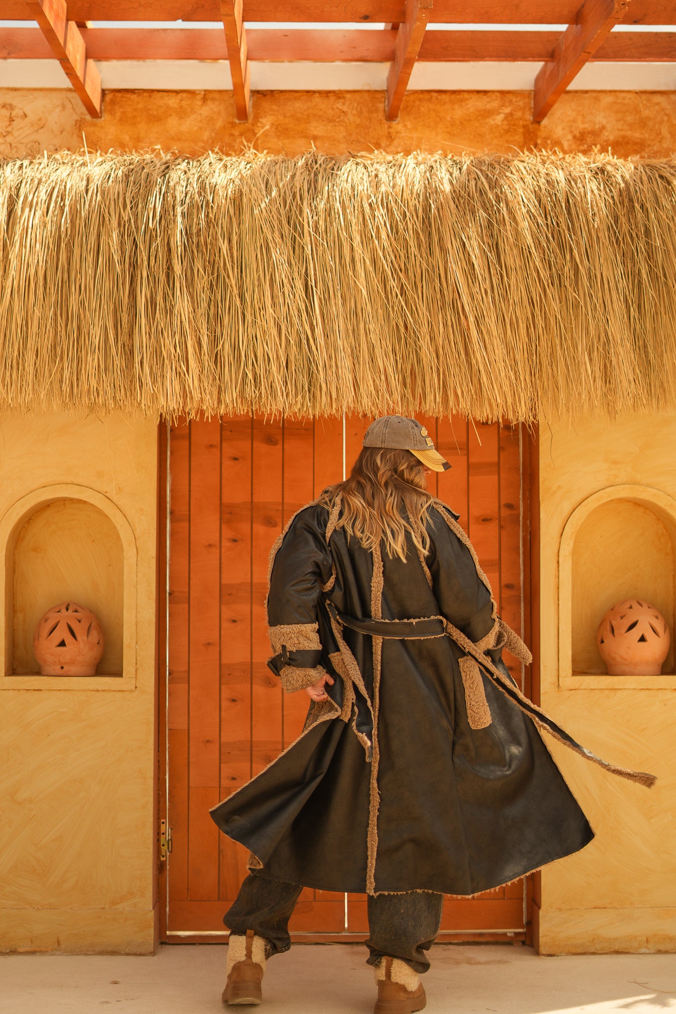 raw edge faux leather long coat