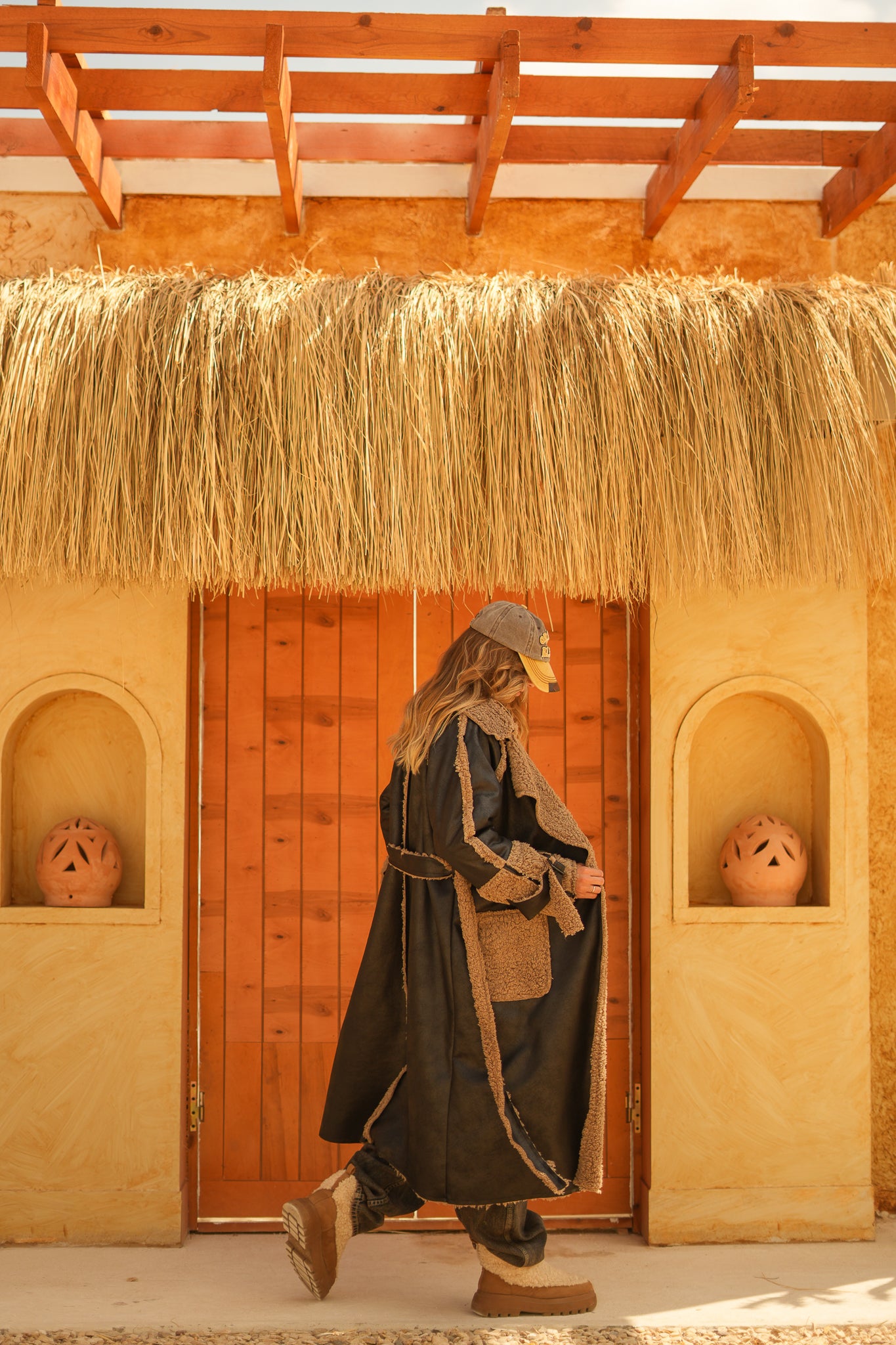 raw edge faux leather long coat