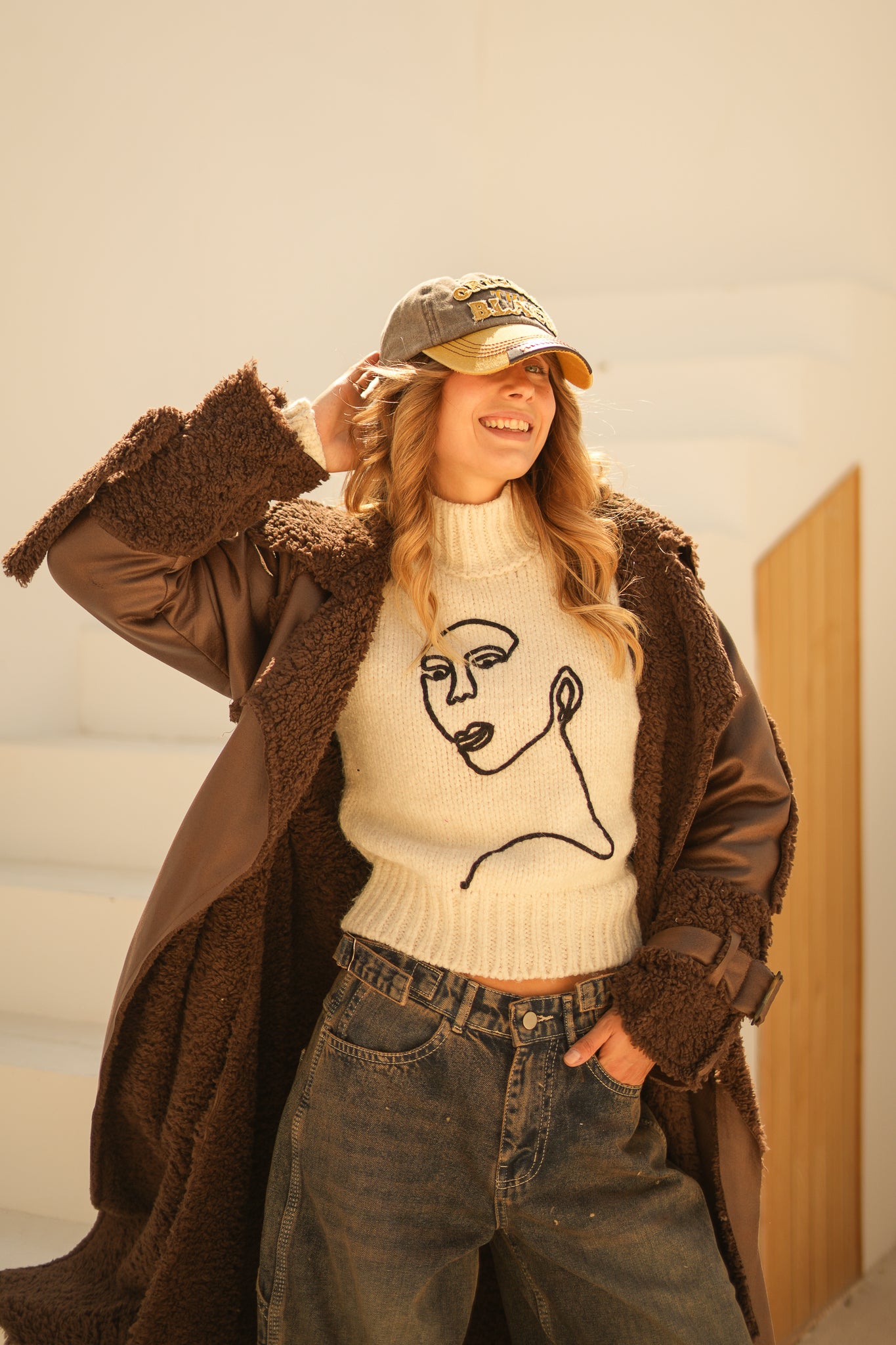 raw edge faux leather long coat