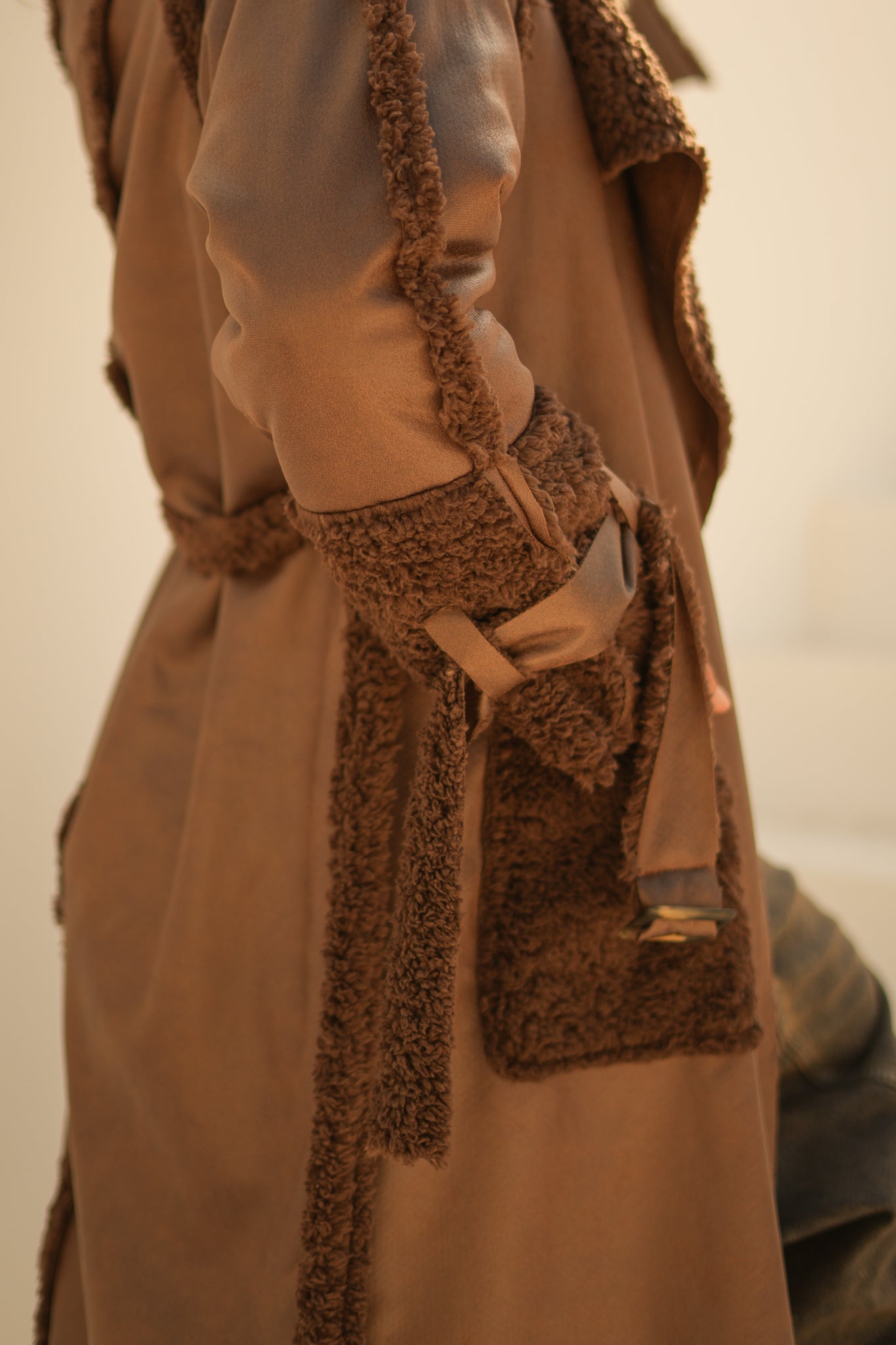 raw edge faux leather long coat