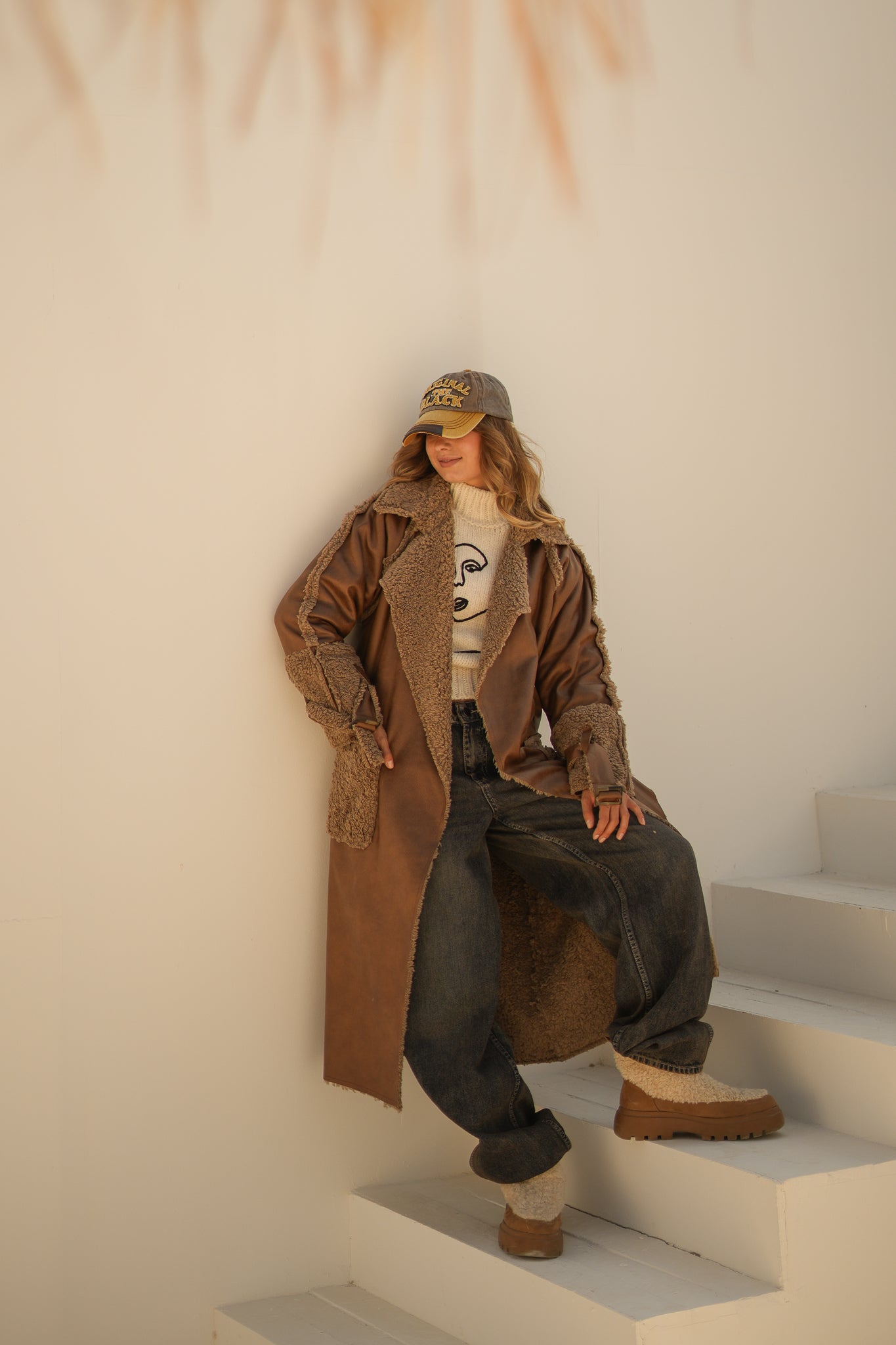 raw edge faux leather long coat