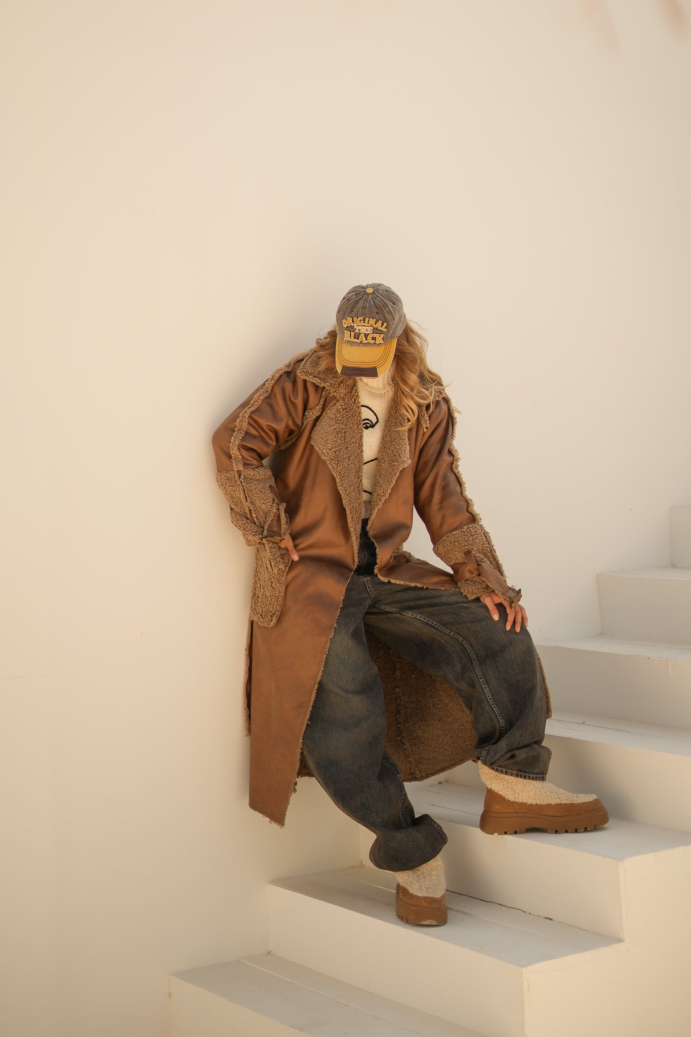 raw edge faux leather long coat