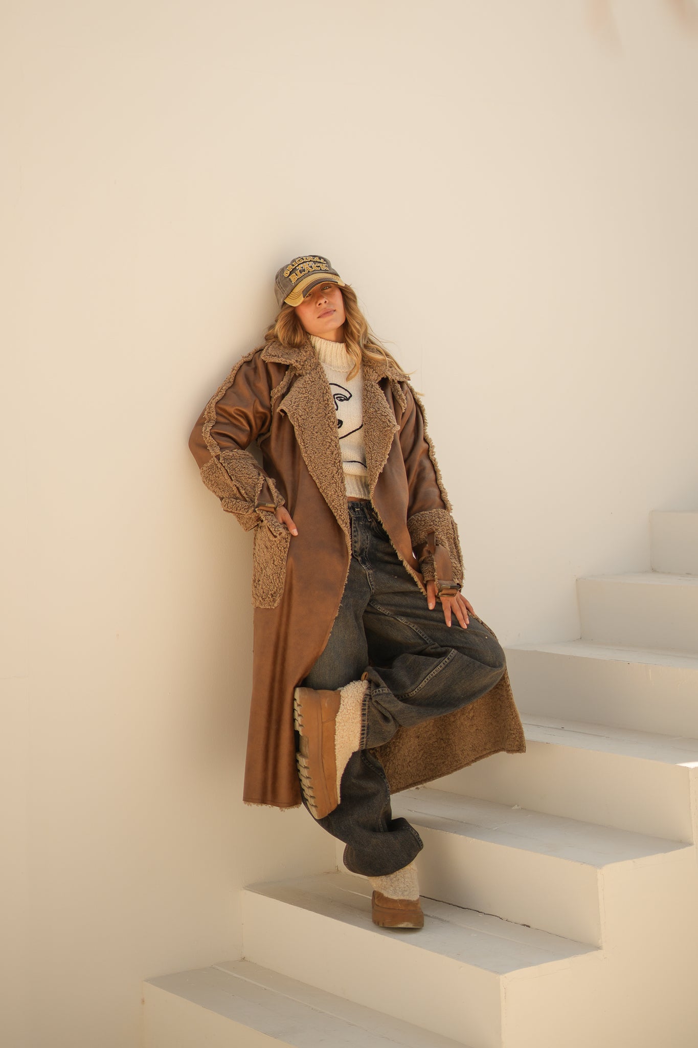 raw edge faux leather long coat