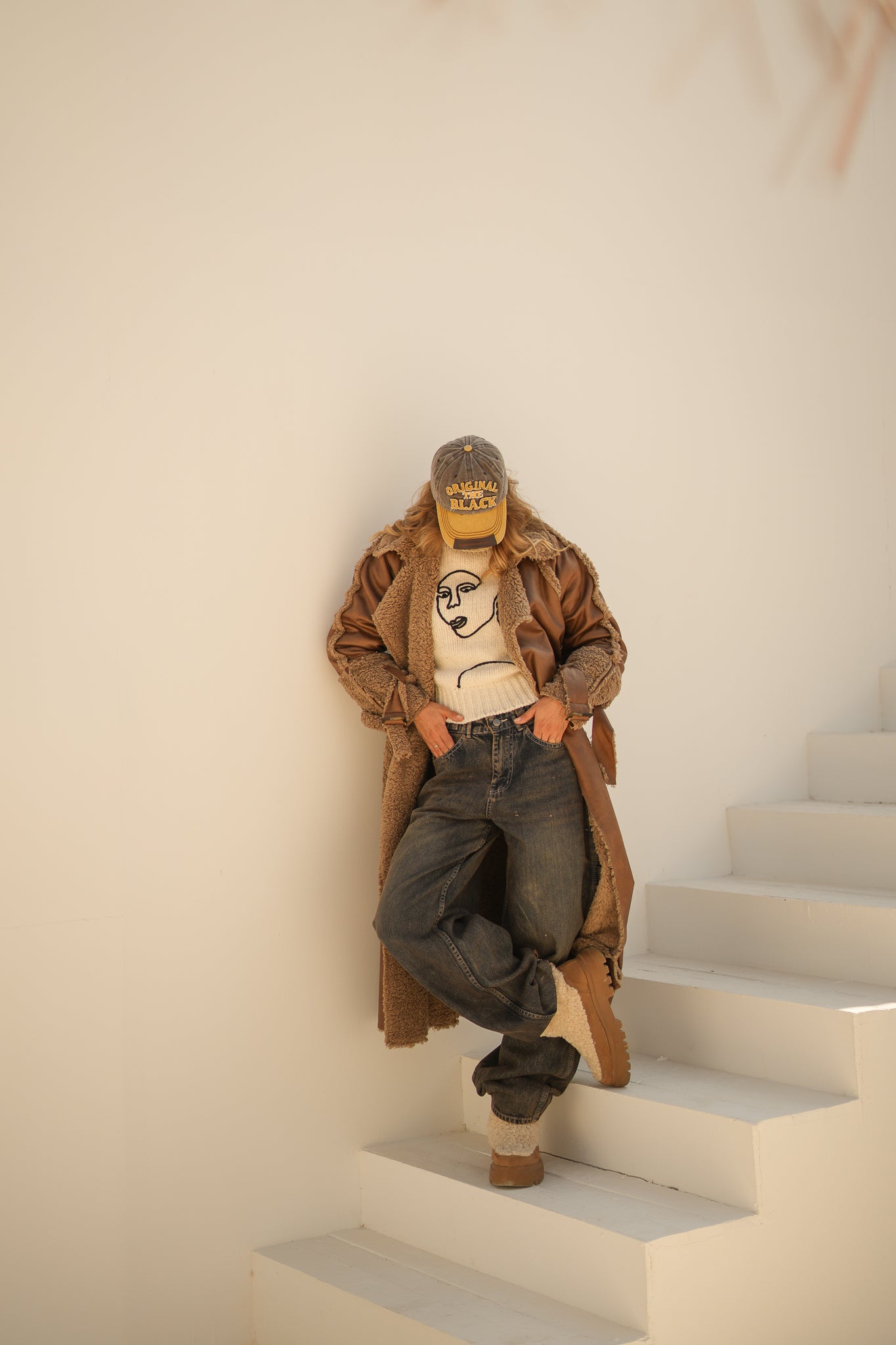 raw edge faux leather long coat