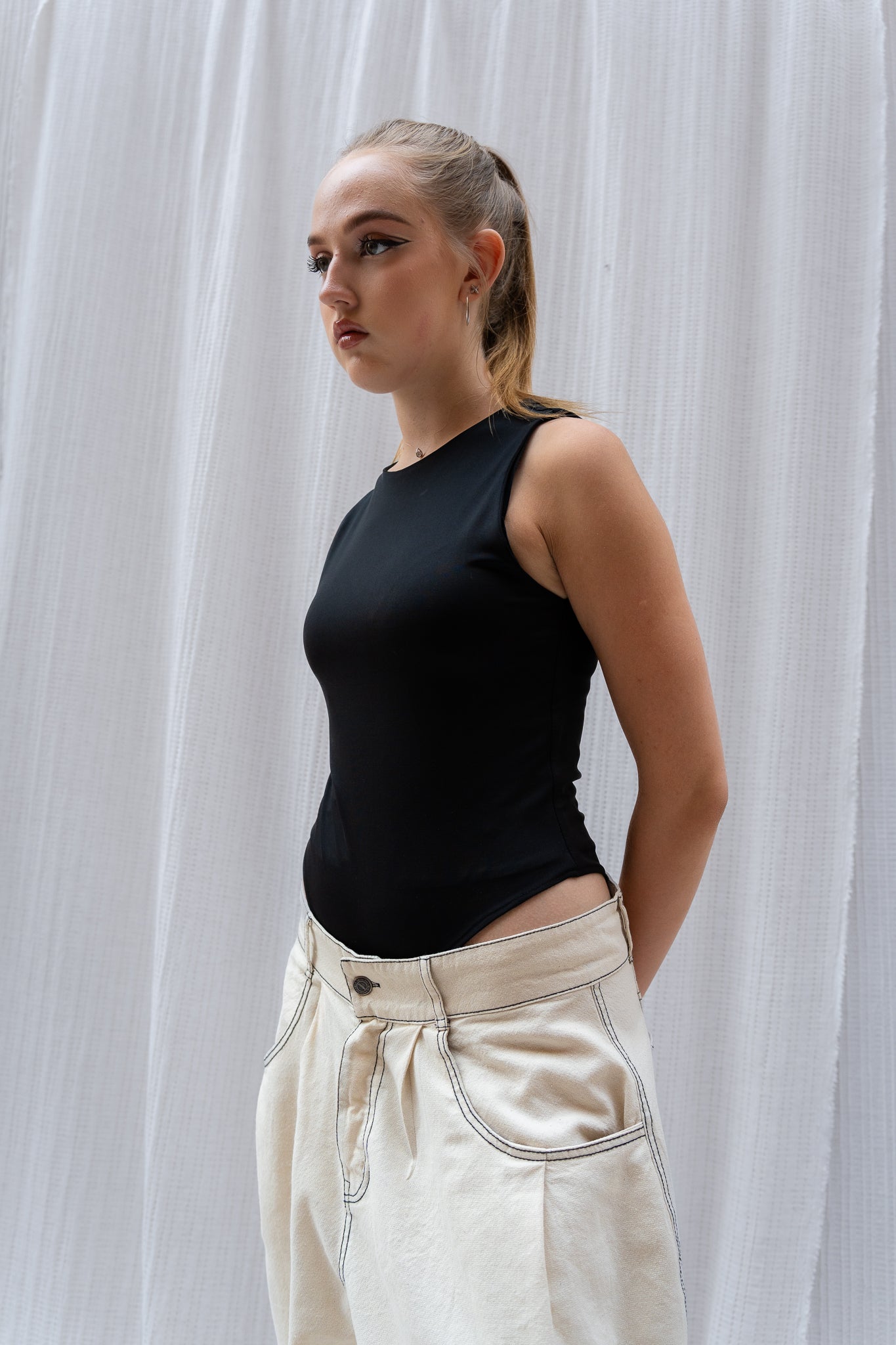 Sleeveless Basic Bodysuit  -  Fitted, Stretchy & Everyday